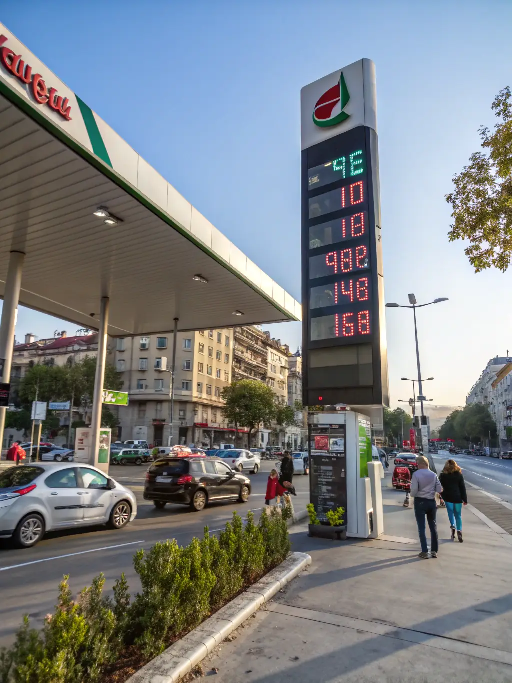 A modern gas station with visible security cameras and digital displays showing fuel prices, emphasizing security and technology integration.